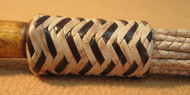 Evenki Cat. -tail leather braided flogger.