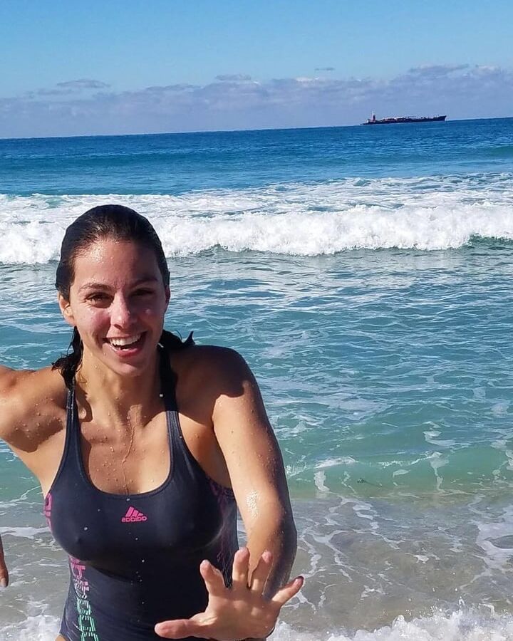 Women in Adidas sports swimsuits