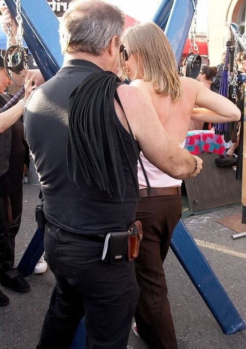 Girl getting a back flogging at Folsom Fair