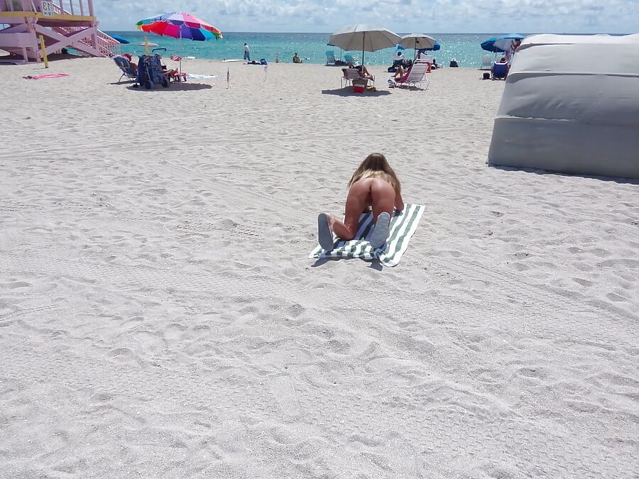 American Nude Beach Slut Bending Over and Spreading Legs