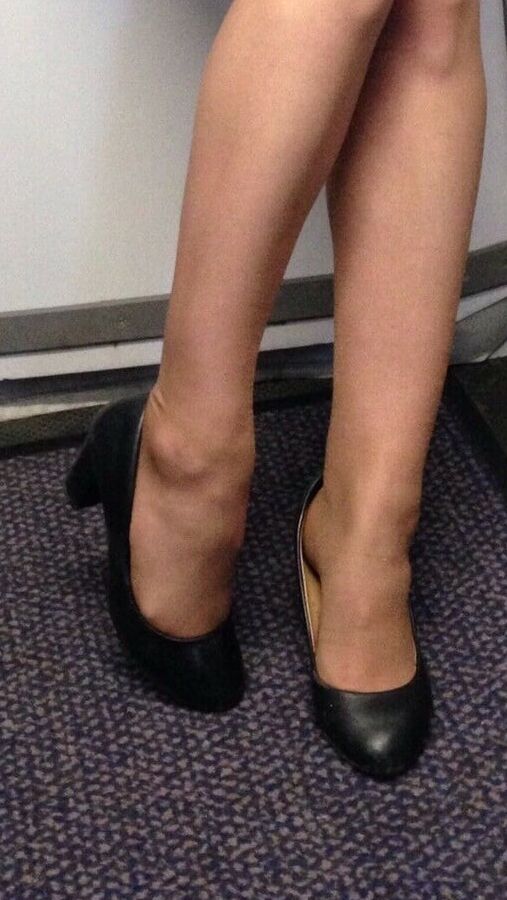Sexy Stewardess in Heels and stockings