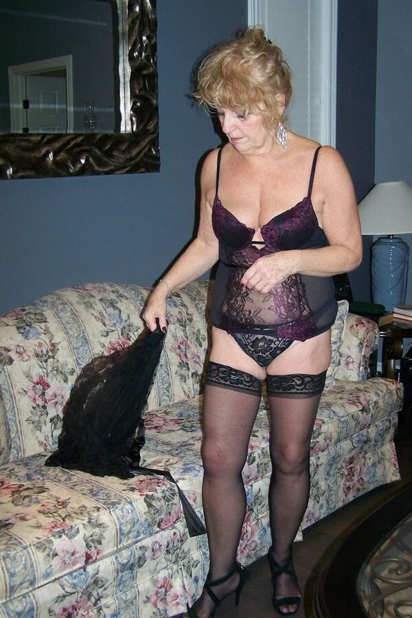 Lounging in lace bustier and nylons