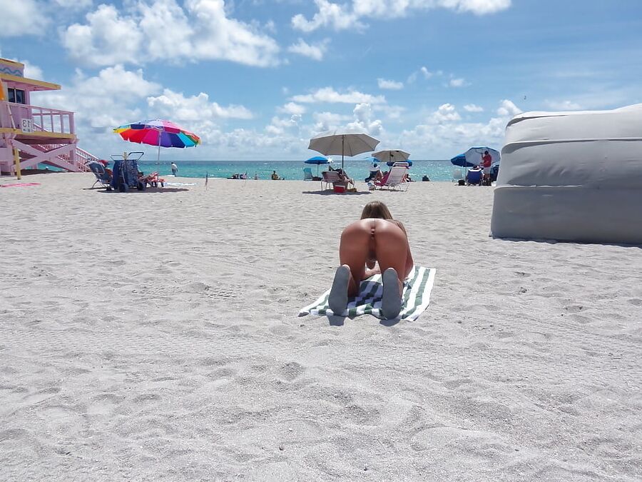 American Nude Beach Slut Bending Over and Spreading Legs