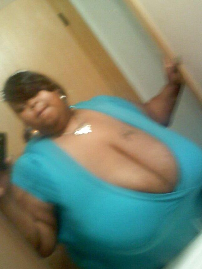 BBW granny in black posing
