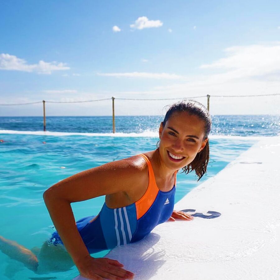 Women in Adidas sports swimsuits