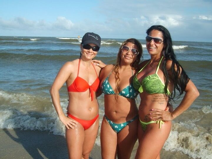 All types of women in the beach .