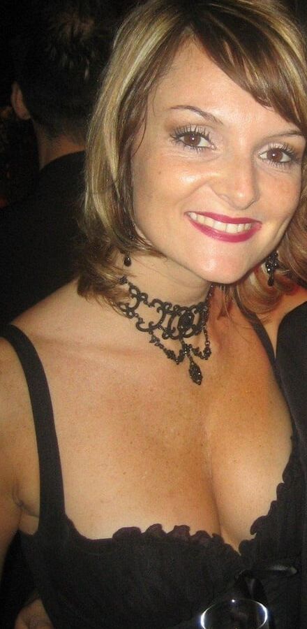 stunning slim mature redhead MILF