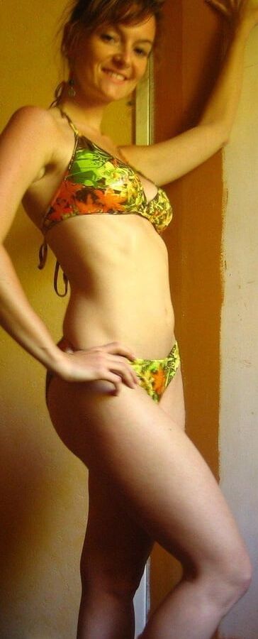 stunning slim mature redhead MILF