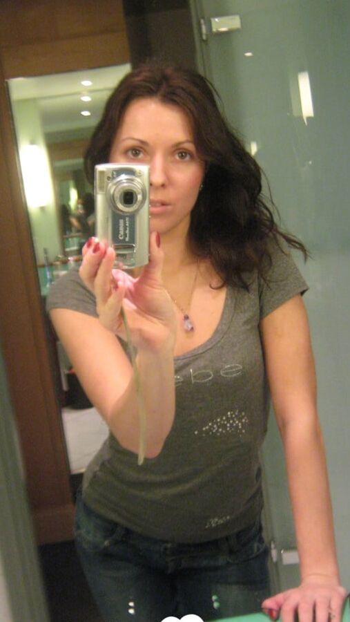 Innocent brunette teasing in her own bathroom