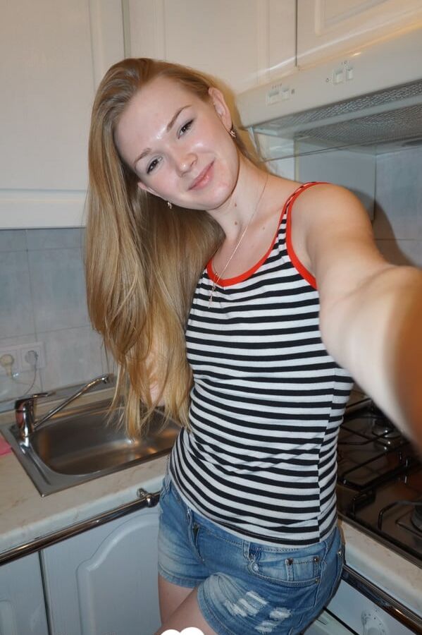 Lovely small-breasted beauty taking some naughty selfies