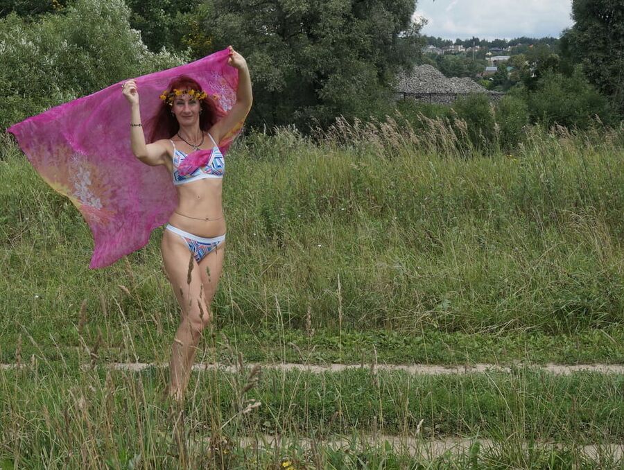 With a pink shawl