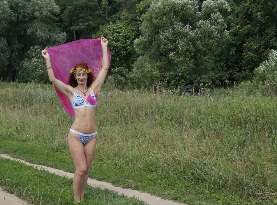 With a pink shawl