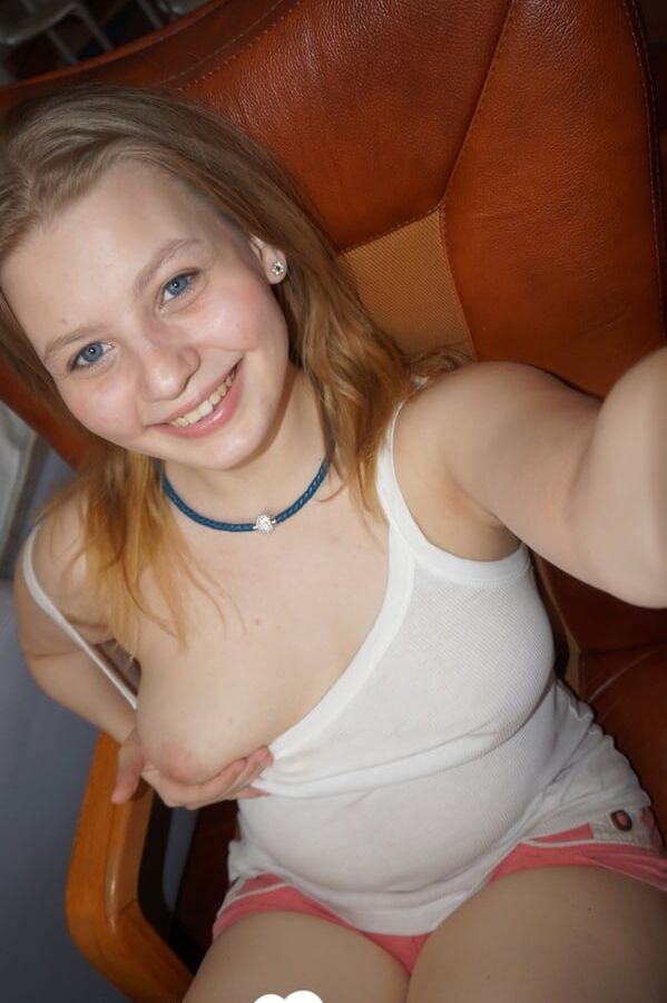 Busty girlfriend exposes her tits to the camera