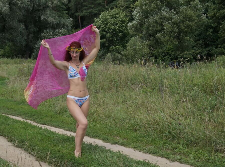 With a pink shawl