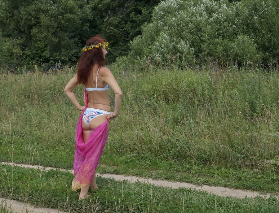 With a pink shawl