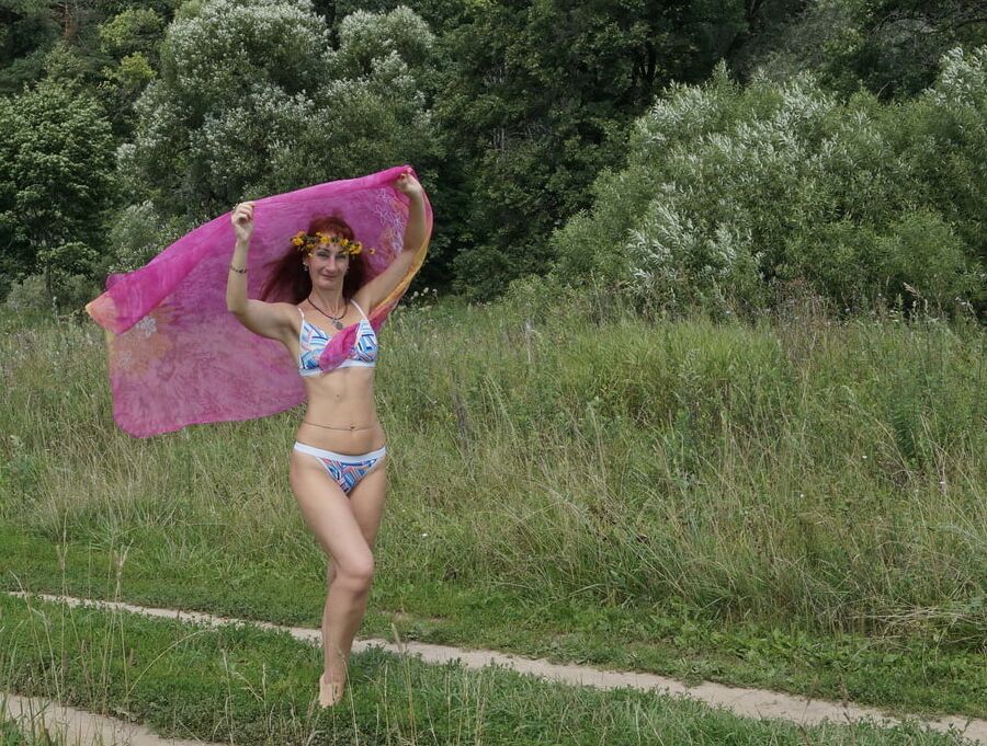 With a pink shawl