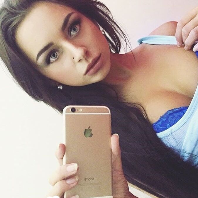 Gorgeous amateur model displaying her amazing curves
