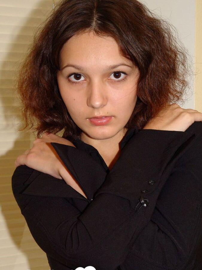 Curly babe cannot have enough of her dildo