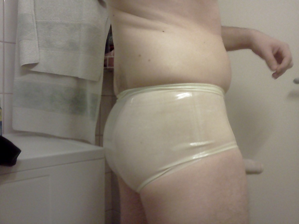 Transparent latex pants with cock sheath