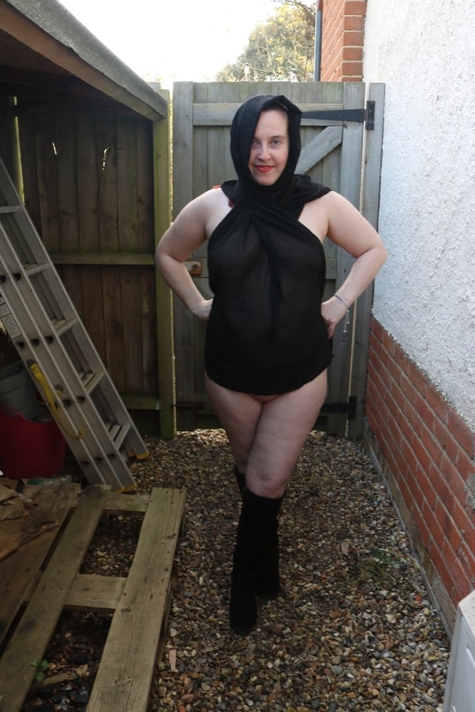 Hijab and Boots in the Yard