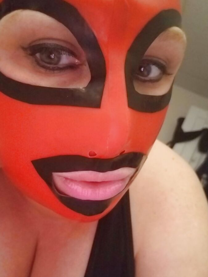Latex Hoods are so much fun and set the mood just right....