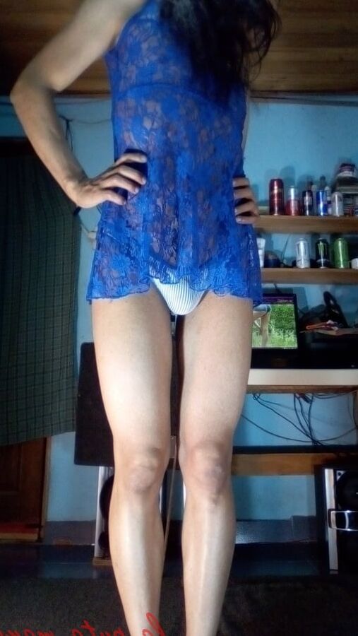 the whore maria wearing a blue dress