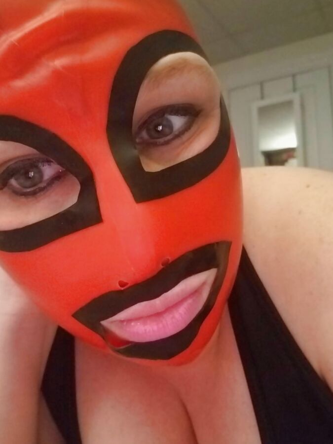 Latex Hoods are so much fun and set the mood just right....