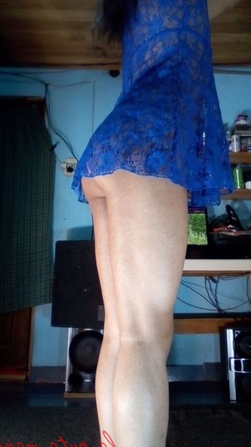 the whore maria wearing a blue dress