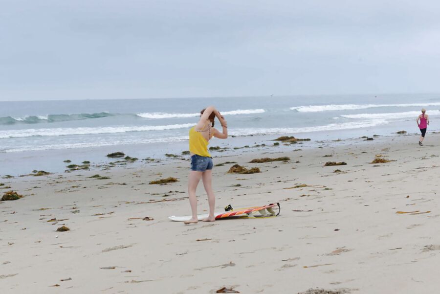 showing her ass on the beach
