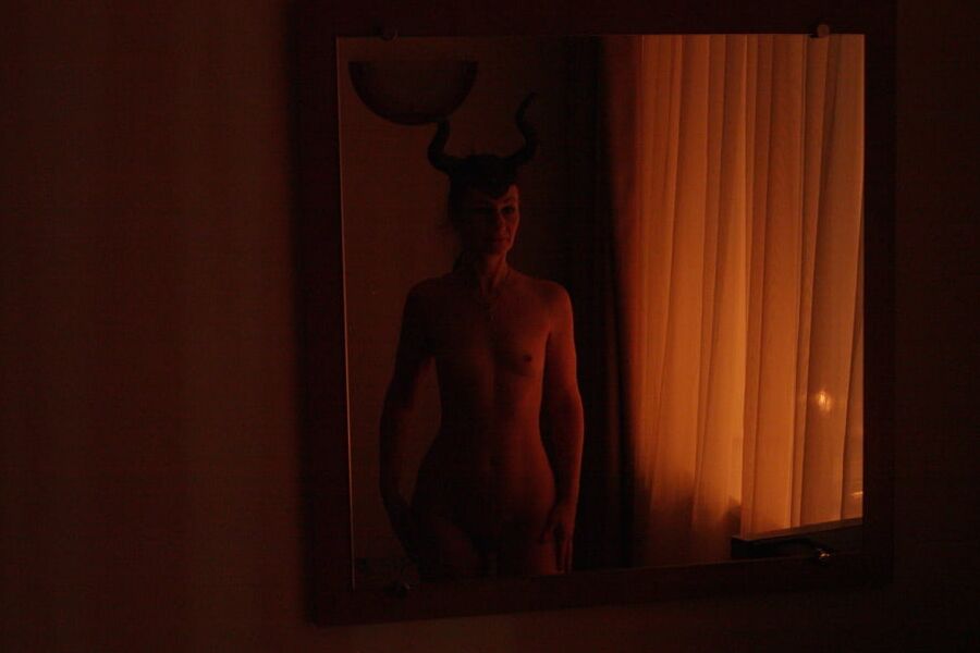 Naked Maleficent with Candles
