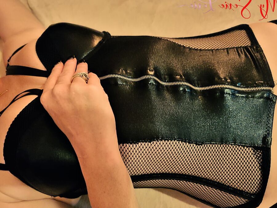 A Corset, A Hip Tie, And A Little Penetration