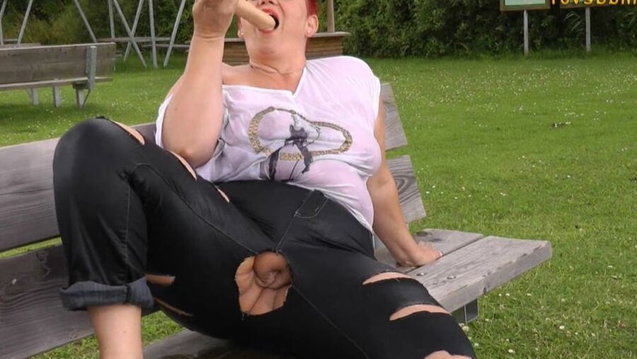With RIPPED JEANS into the lake