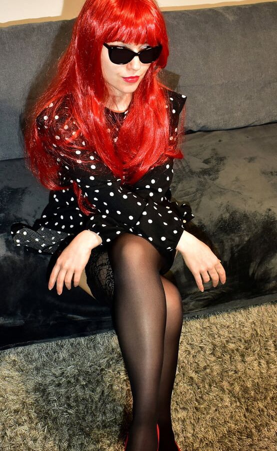 Redhead wife with black stockings and red high heels