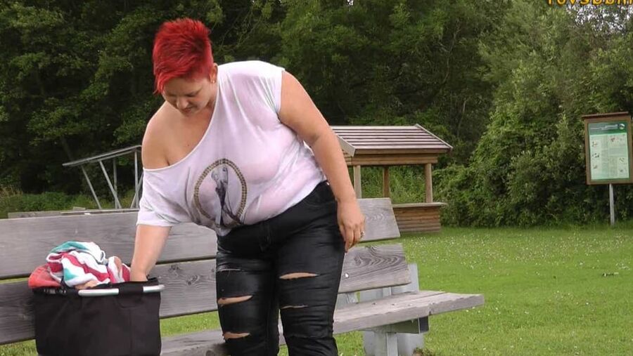 With RIPPED JEANS into the lake