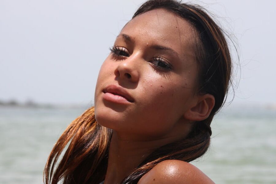 Cute tanned latina Gabrielle loves posing nude outdoors