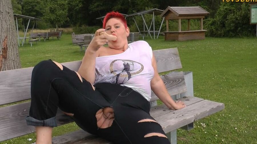 With RIPPED JEANS into the lake