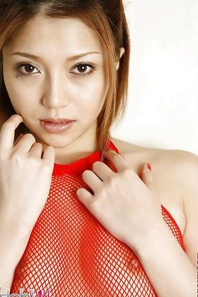Japanese Aki Anzai in fishnet lingerie