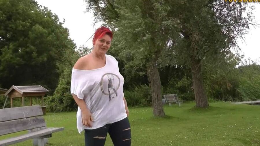 With RIPPED JEANS into the lake