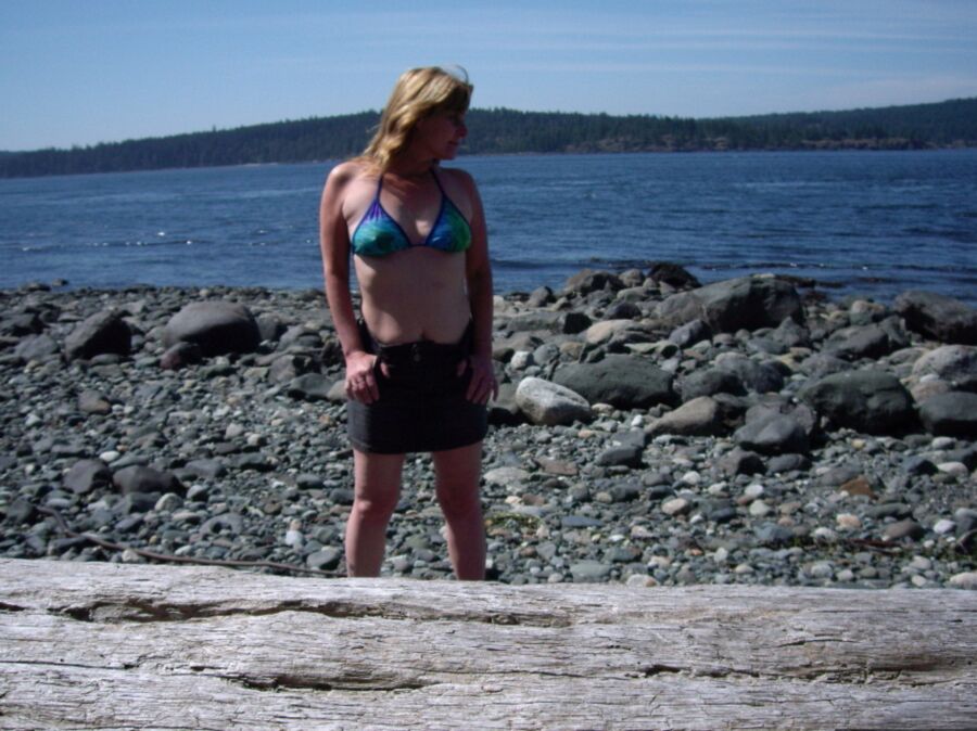 In light-blue bikini