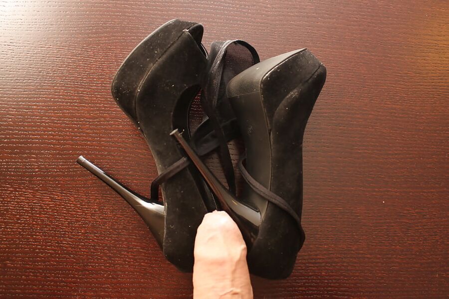 All black:heels, panties, suspenders, stockings, dress, cum