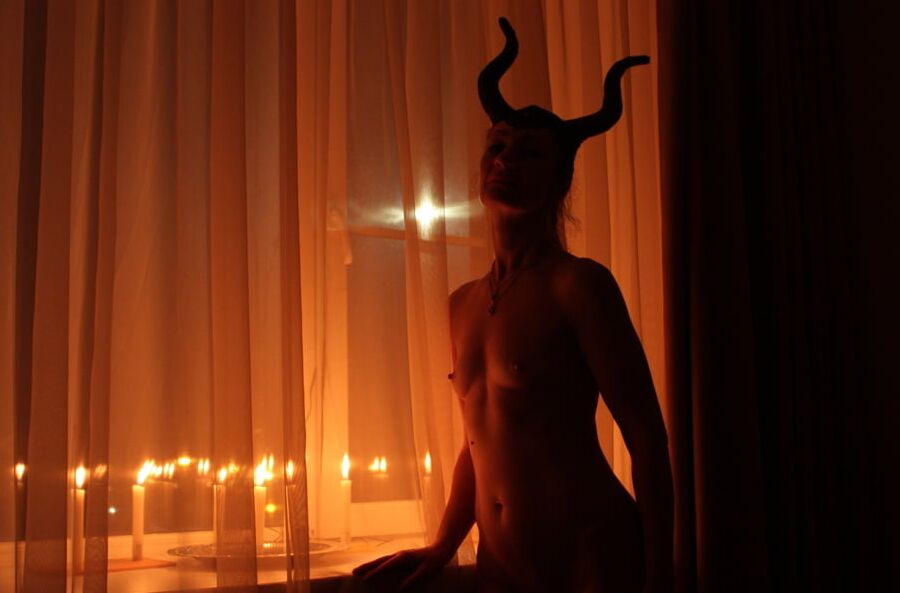 Naked Maleficent with Candles