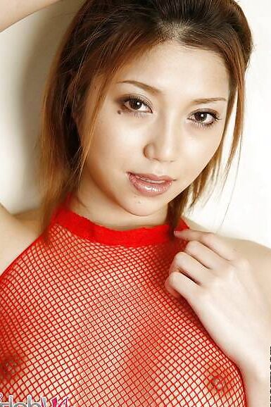 Japanese Aki Anzai in fishnet lingerie
