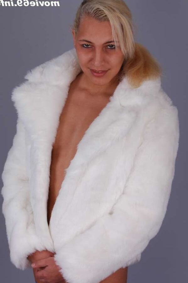 Teen Nathalie just wearing fur, stockings and high heels
