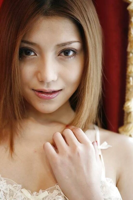 Japanese Aki Anzai in fishnet lingerie