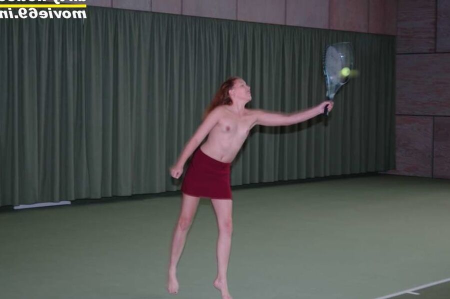 Nathalie plays naked tennis in a tennis hall