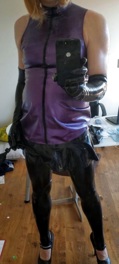 Purple latex with anal plug and pumo