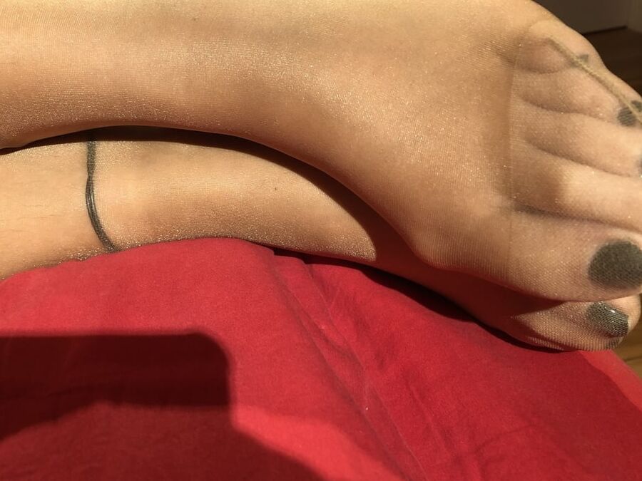 High Heels and Nylons on Bed