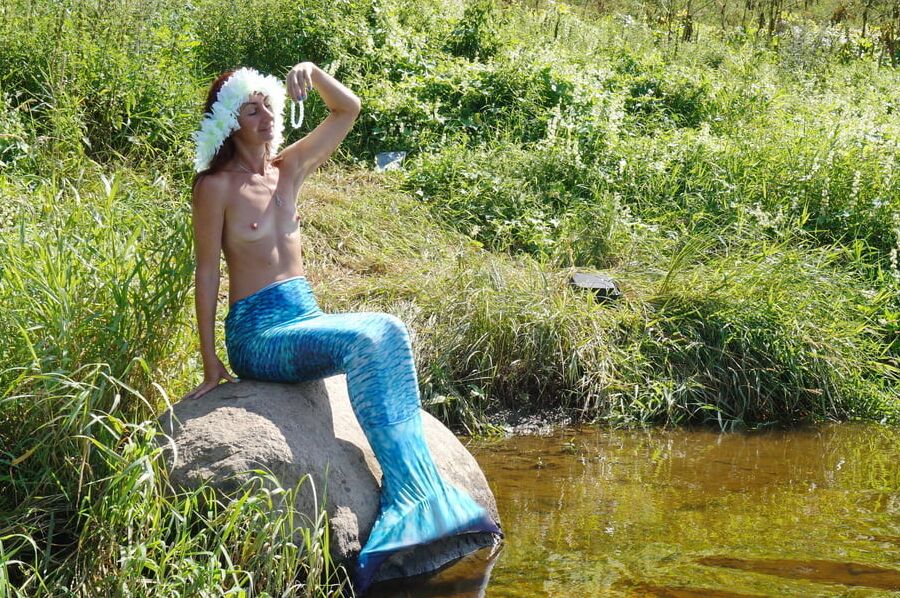 Mermaid on boulder