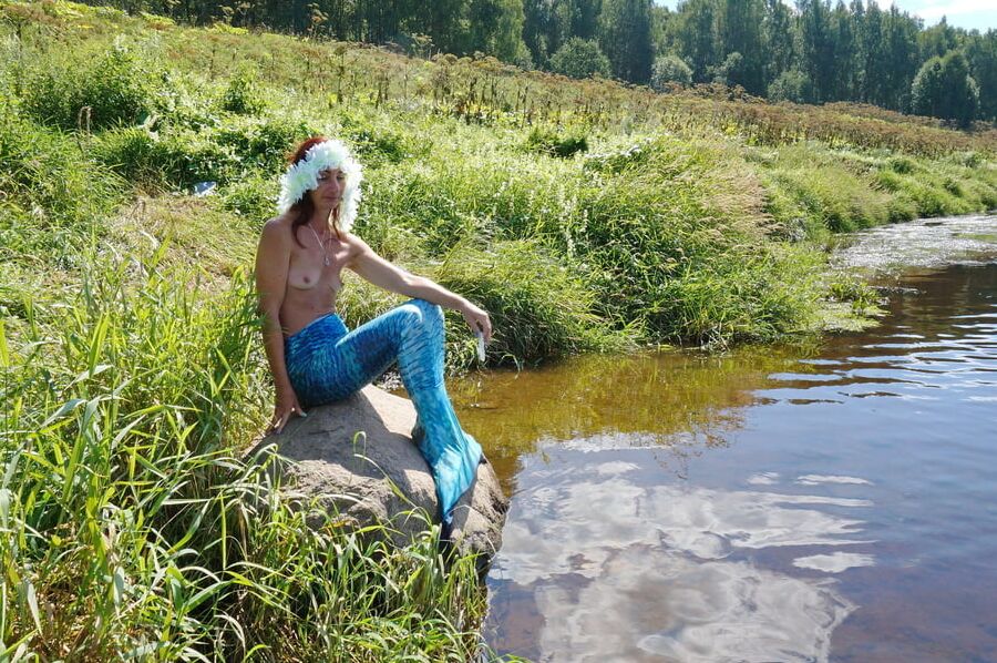 Mermaid on boulder
