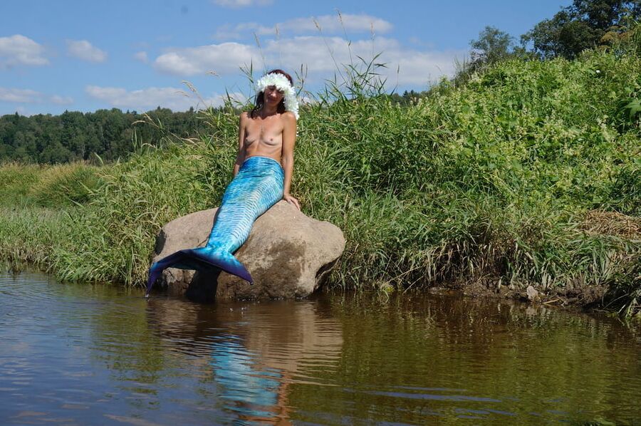 Mermaid on boulder